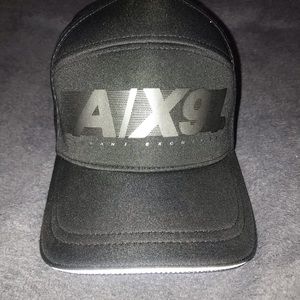 Baseball cap by Armani Exchange.